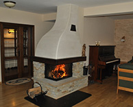 Nasze realizacje - Rustykalne NR-R-31 - Kominek rustykalny wykonany z piaskowca komborskiego. Wewnątrz 

wkład z płaszczem wodnym Spartherm Varia 2Lh H2O Linear z szybą przesuwaną do góry. Czopuch tynkowany w stylu rustykalnym. 

projekt: Marcin Deręgowski